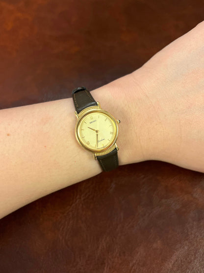 Seiko Exceline Gold Beaded Detail Women’s Watch, worn on the wrist.