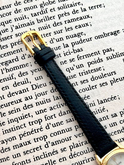 Detail of the black aftermarket leather strap on the Seiko Exceline watch.