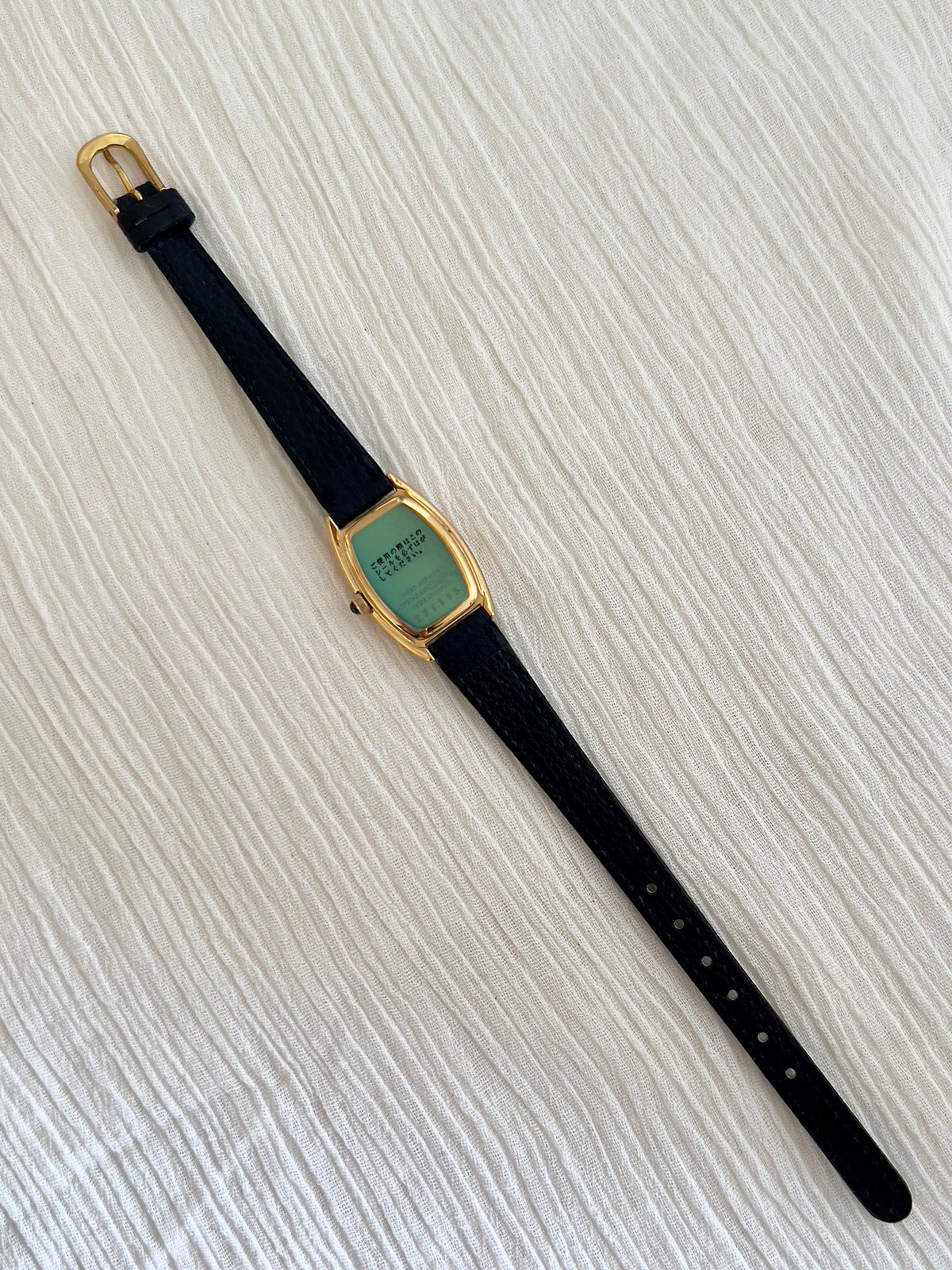 Seiko Exceline Gold Tonneau Women’s Watch with Arabic Dial — full strap and caseback.