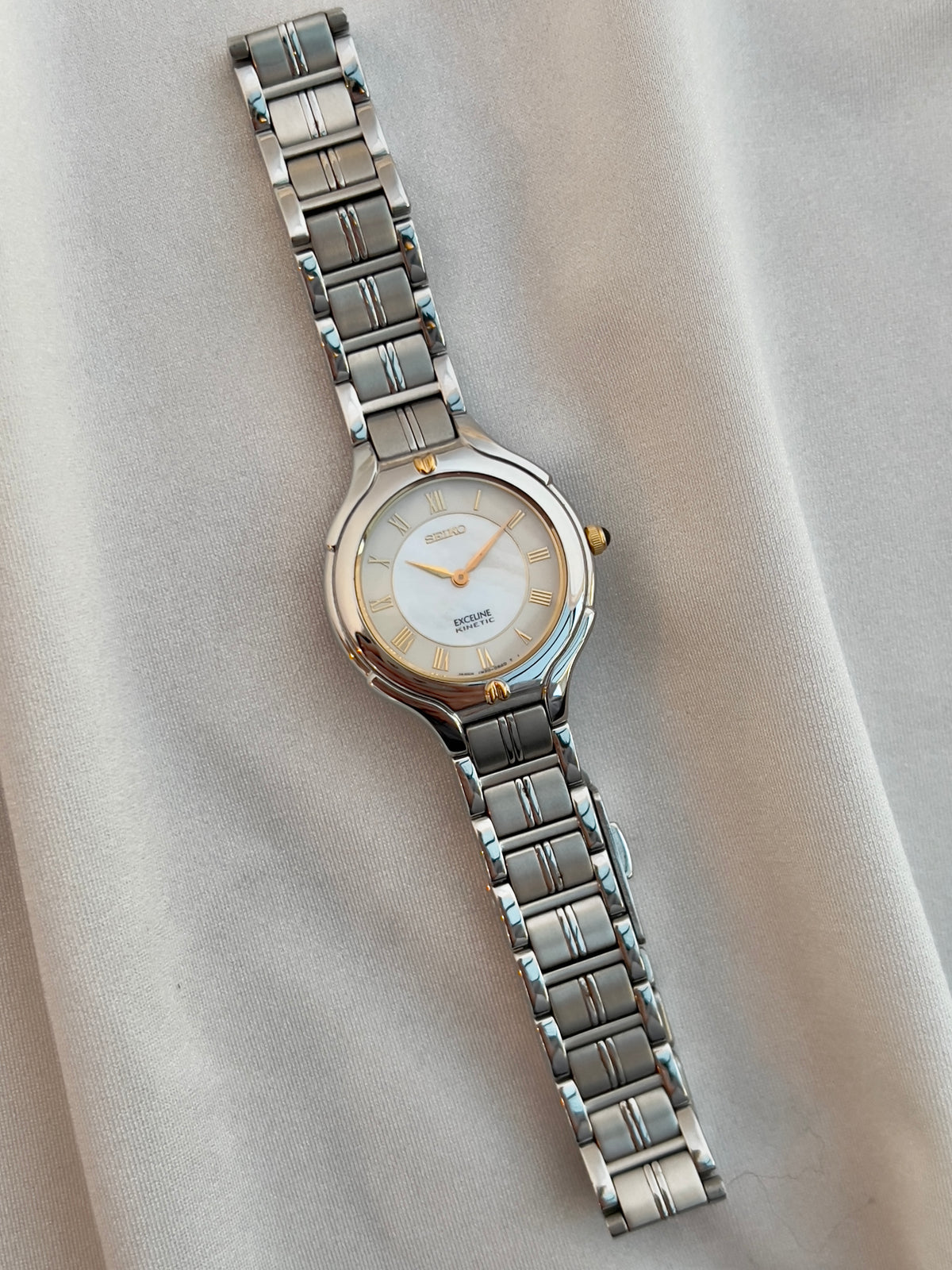 Seiko Exceline Kinetic Ladies’ Watch Mother of Pearl Dial, angled view of a vintage women's watch at Gilded Hour.