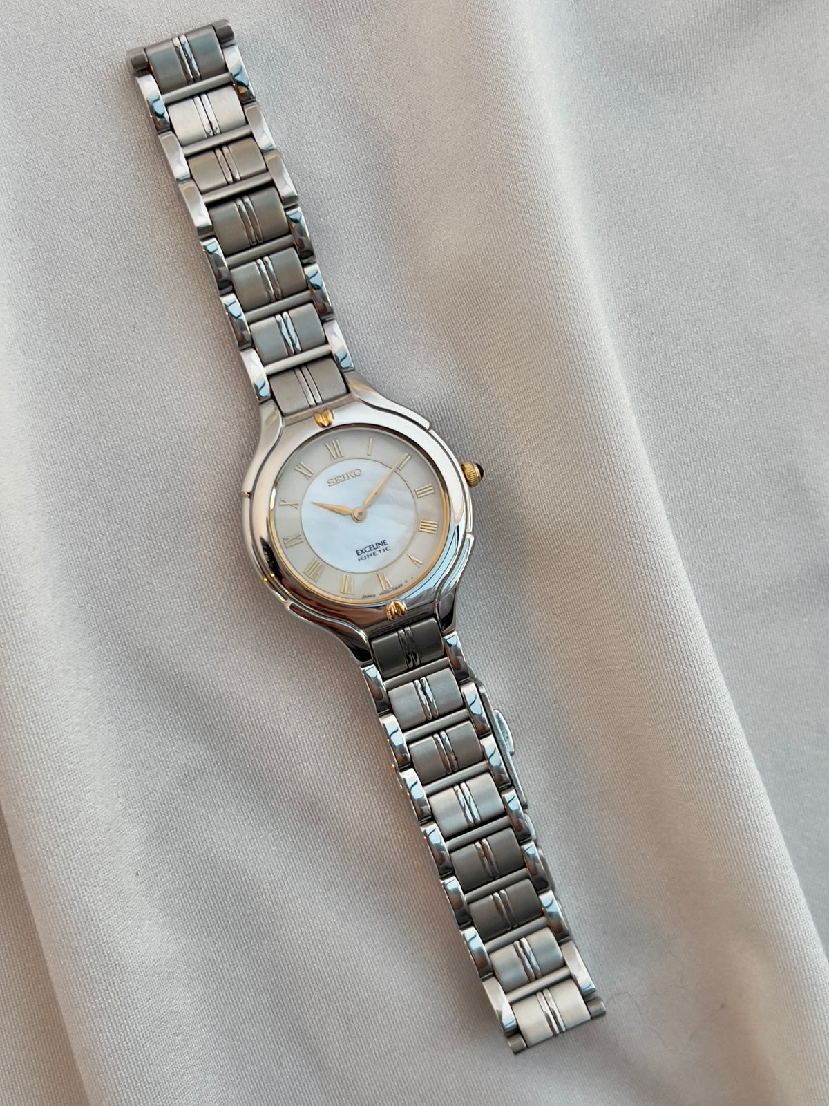 Seiko Exceline Kinetic Ladies’ Watch Mother of Pearl Dial, bracelet detail of a vintage women's watch at Gilded Hour.