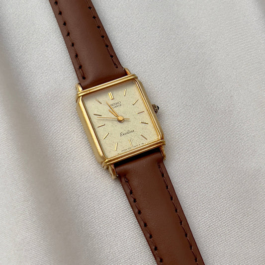 Seiko Exceline Ladies Gold Tank Watch, bracelet detail of a vintage women's watch at Gilded Hour.