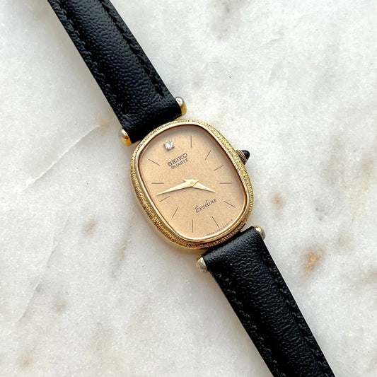 Seiko Exceline One Diamond Champagne Dial Ladies Watch on Black Leather, product view 1.
