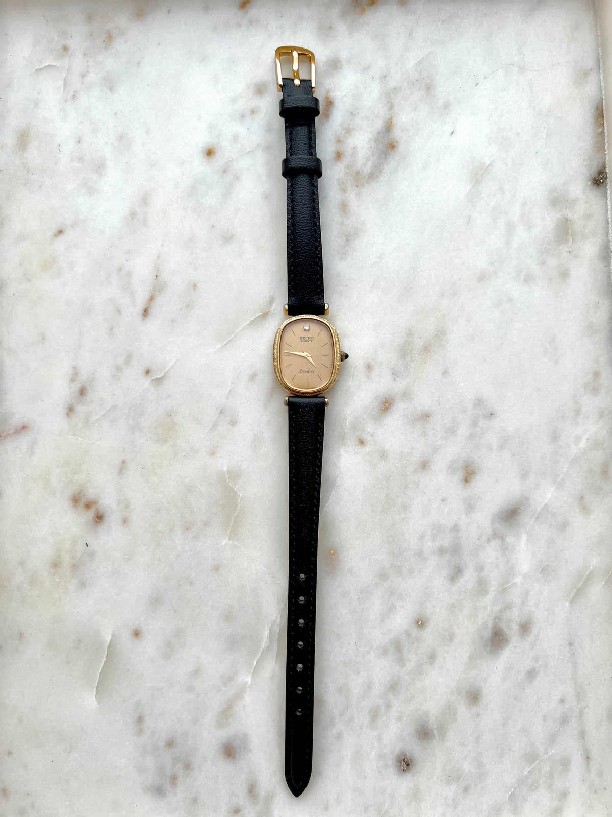 Seiko Exceline One Diamond Gold Dial Leather watch 2320-6200: full front view of the watch.