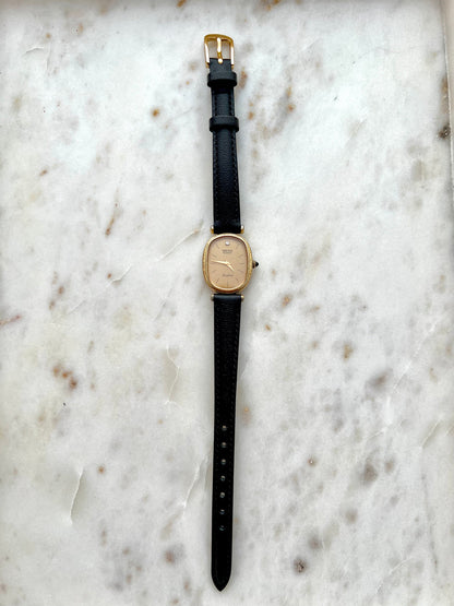 Seiko Exceline One Diamond Gold Dial Leather watch 2320-6200: full front view of the watch.