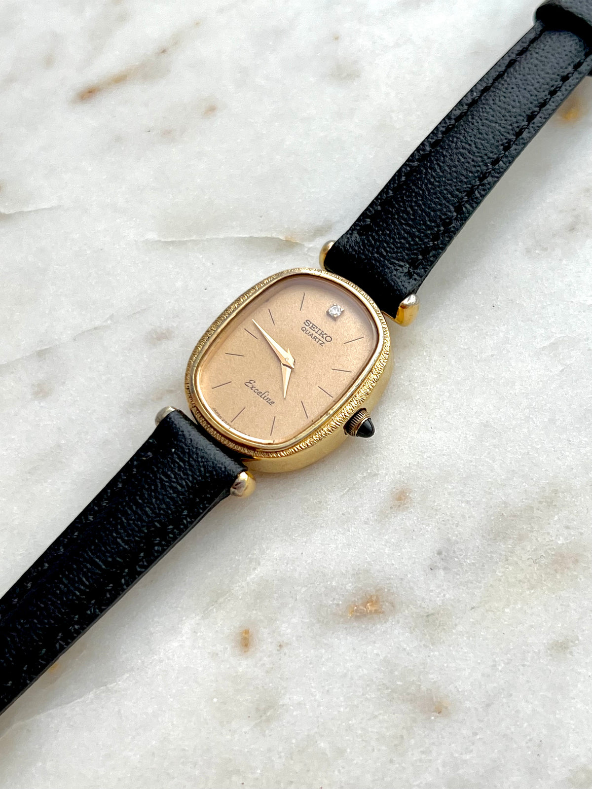 Seiko Exceline One Diamond Gold Dial Leather watch 2320-6200: close view of the dial and case.