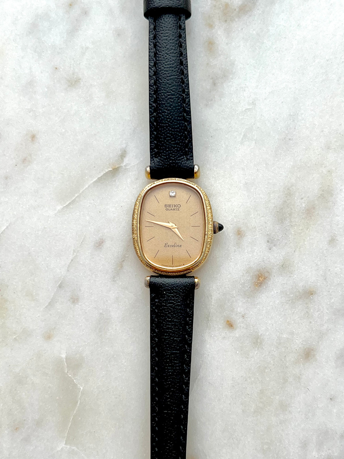 Seiko Exceline One Diamond Gold Dial Leather watch 2320-6200: full front view of the watch.