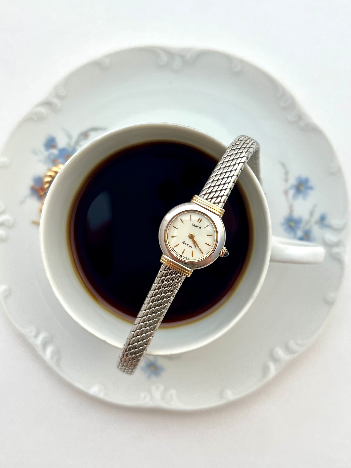 Seiko Two Toned Snake Skin Pattern Bracelet Watch, angled view of a vintage women's watch at Gilded Hour.