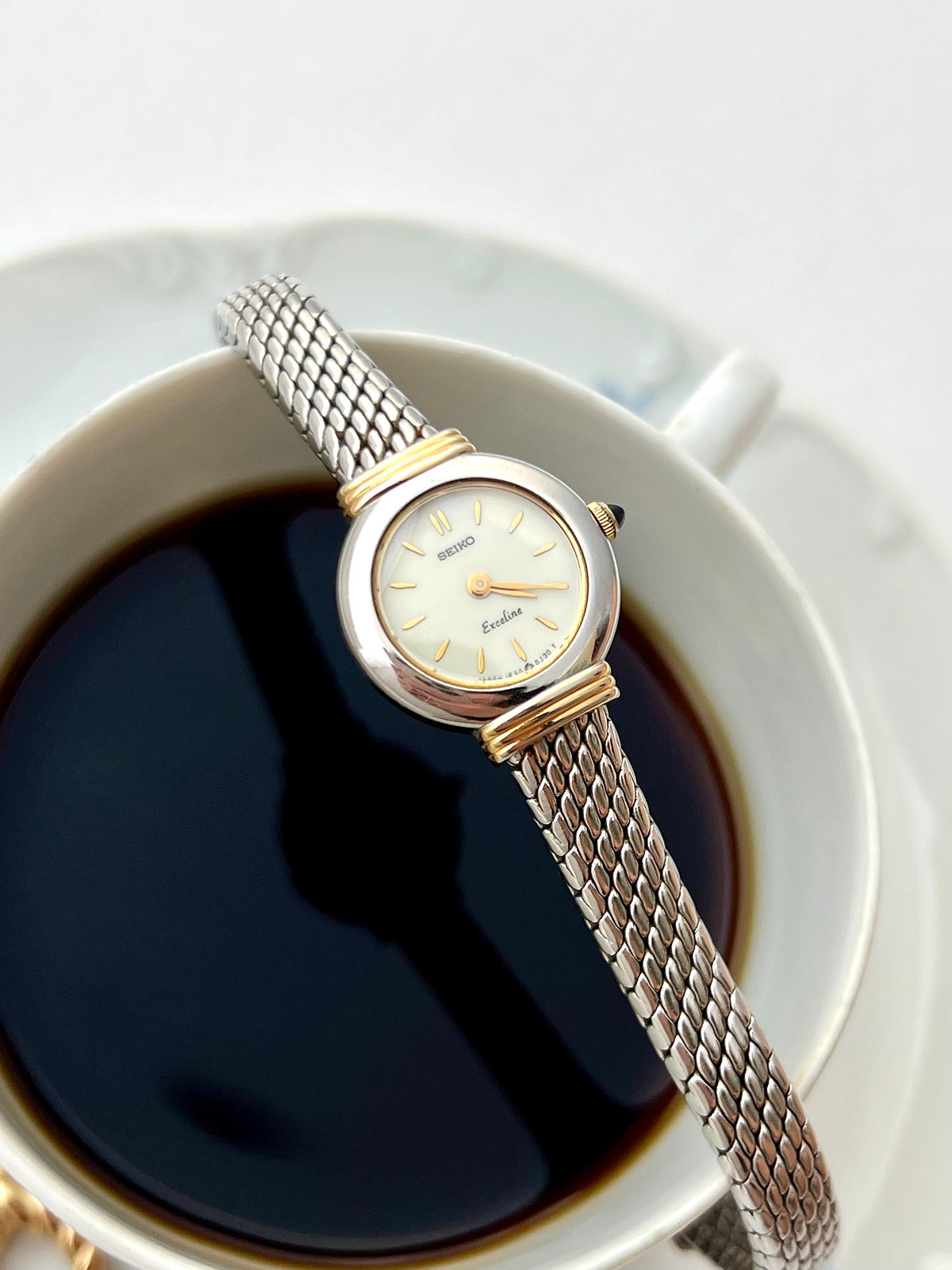 Seiko Two Toned Snake Skin Pattern Bracelet Watch, wrist shot of a vintage women's watch at Gilded Hour.