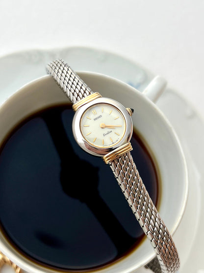 Seiko Two Toned Snake Skin Pattern Bracelet Watch, wrist shot of a vintage women's watch at Gilded Hour.