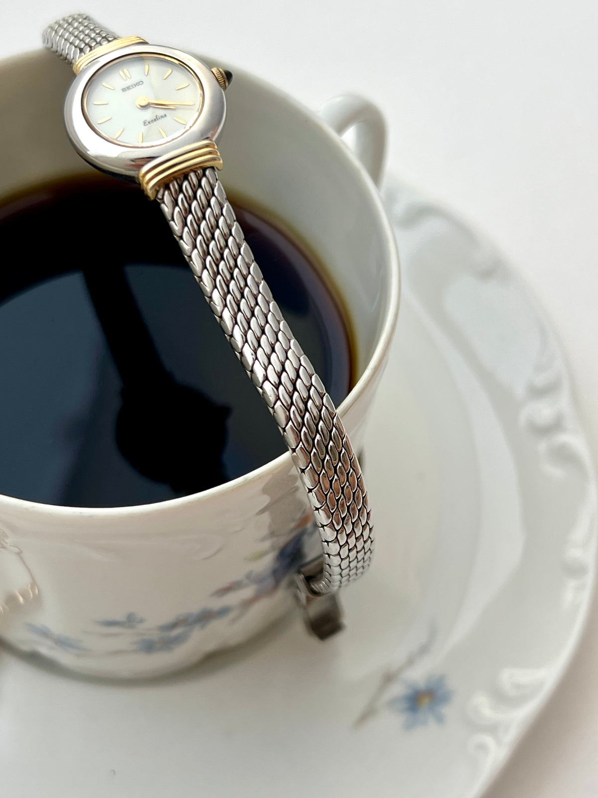 Seiko Two Toned Snake Skin Pattern Bracelet Watch, case profile of a vintage women's watch at Gilded Hour.