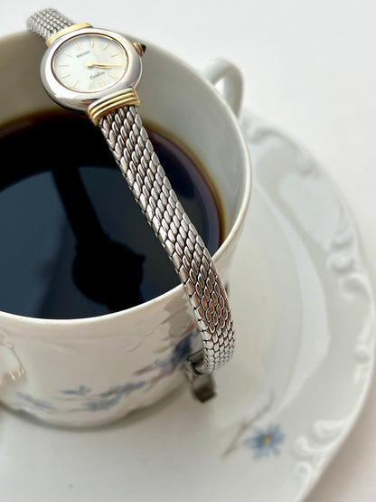 Seiko Two Toned Snake Skin Pattern Bracelet Watch, case profile of a vintage women's watch at Gilded Hour.