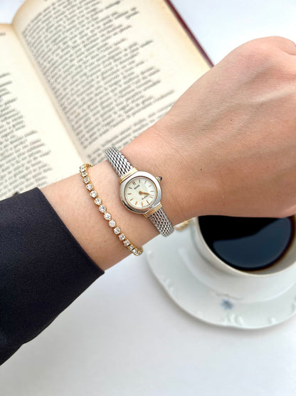 Seiko Two Toned Snake Skin Pattern Bracelet Watch, caseback detail of a vintage women's watch at Gilded Hour.