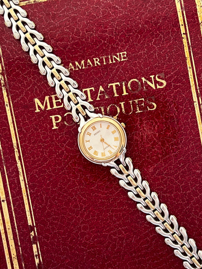 Seiko Exceline Roman Dial Two Tone Women’s Watch featuring white dial and integrated bracelet; vintage watch product image 3.