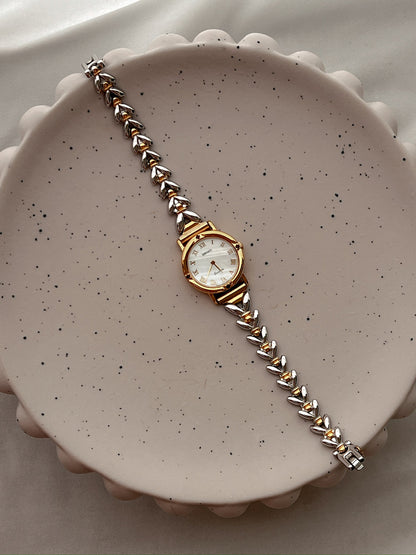 Seiko Exceline Ruby Accent Two Tone Women’s Watch featuring mother of pearl dial and two tone bracelet; vintage watch product image 4.