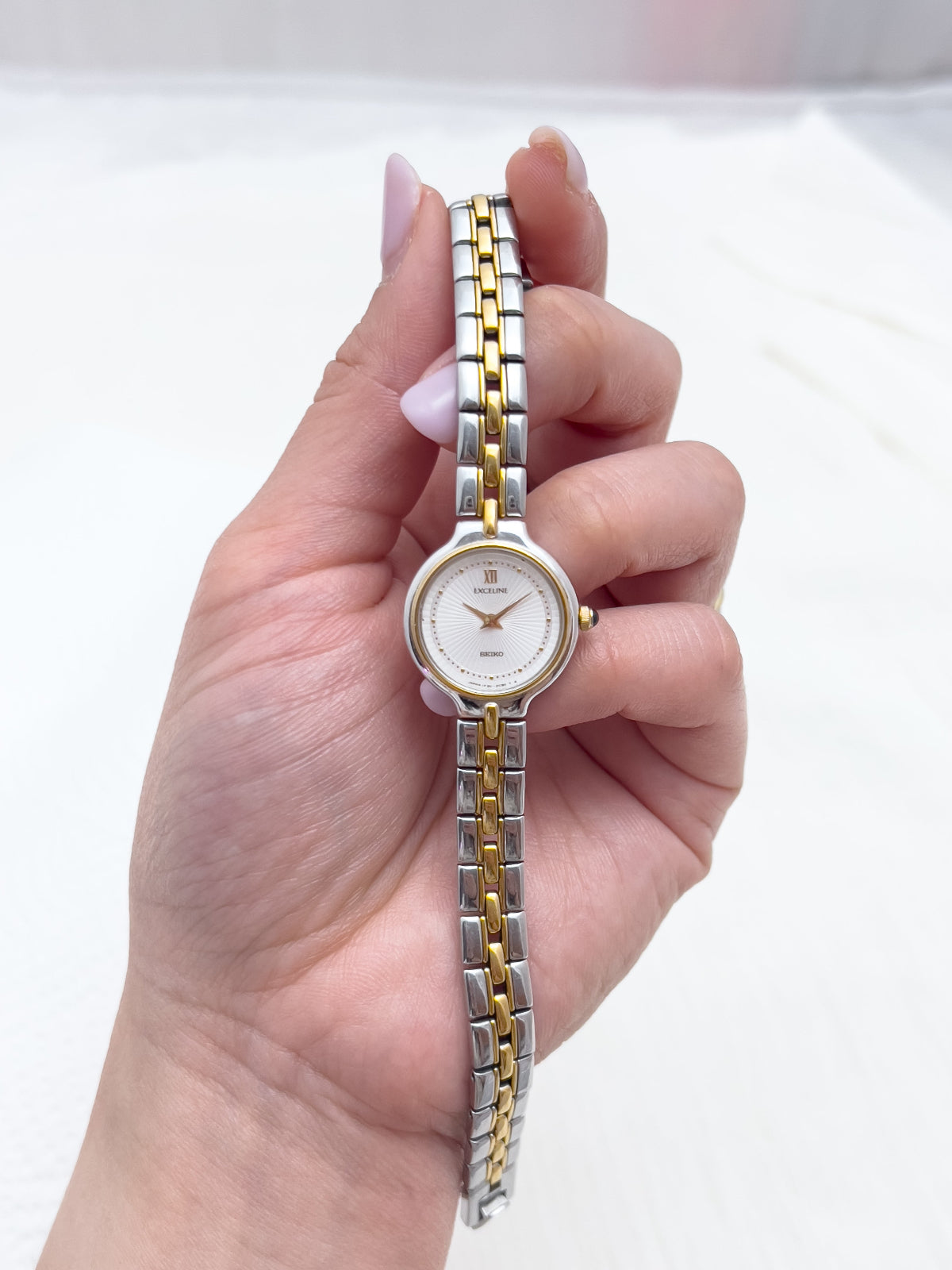Seiko Exceline Woman's Watch with Sunburst Dial, dial close up of a vintage women's watch at Gilded Hour.