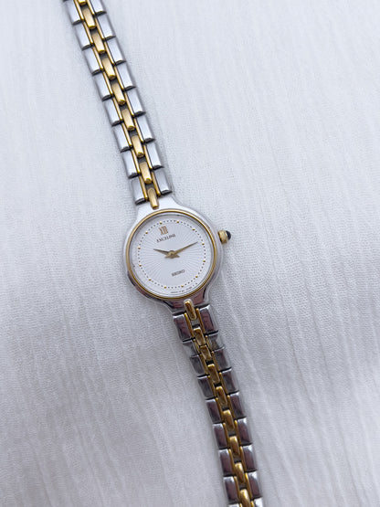 Seiko Exceline Woman's Watch with Sunburst Dial, case profile of a vintage women's watch at Gilded Hour.