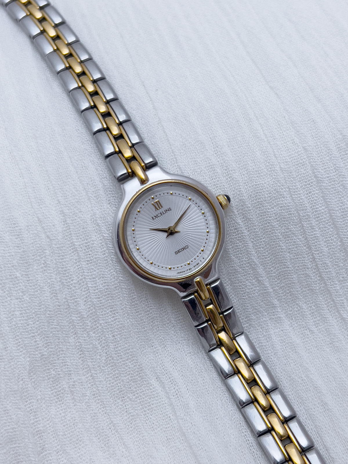 Seiko Exceline Woman's Watch with Sunburst Dial, dial close up of a vintage women's watch at Gilded Hour.