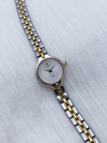 Seiko Exceline Woman's Watch with Sunburst Dial, angled view of a vintage women's watch at Gilded Hour.