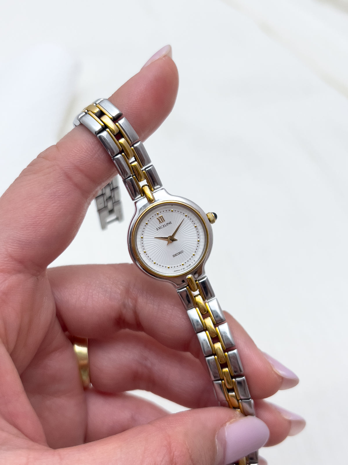 Seiko Exceline Woman's Watch with Sunburst Dial, wrist shot of a vintage women's watch at Gilded Hour.