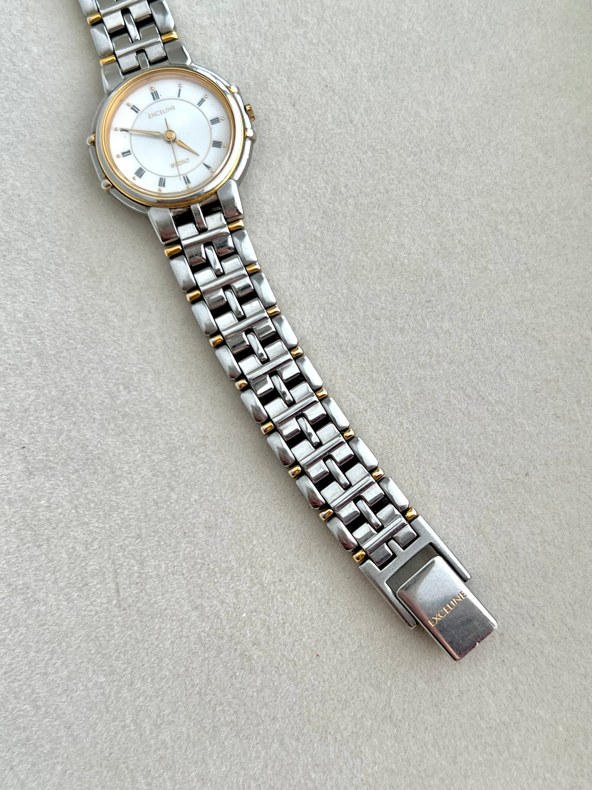 Seiko Exceline Two Toned Watch, angled view of a vintage women's watch at Gilded Hour.