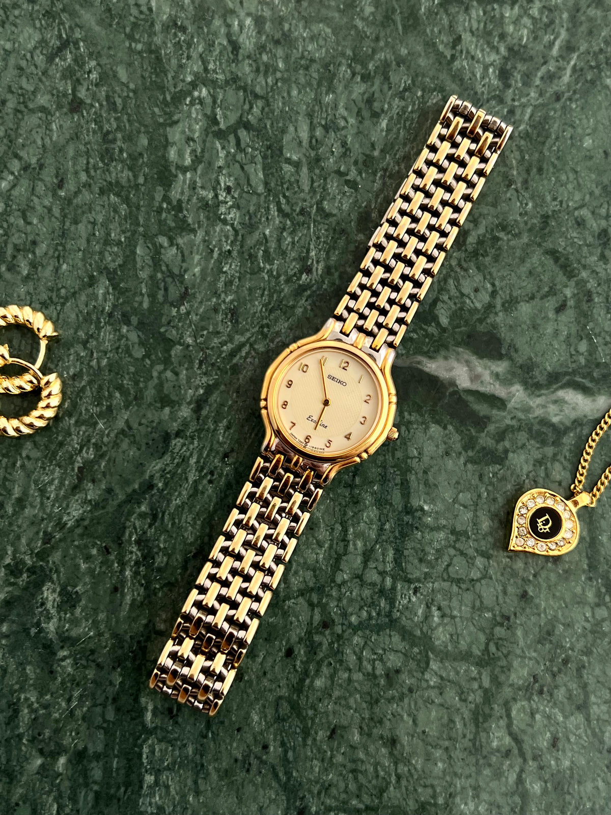 Detail of the Seiko Exceline woven gold and steel bracelet links.