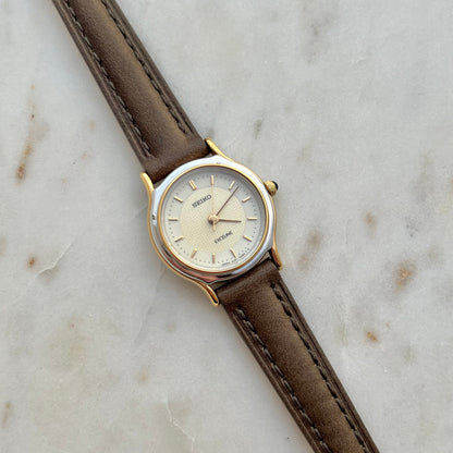 Seiko Exceline two tone round patterned dial watch, view 1.