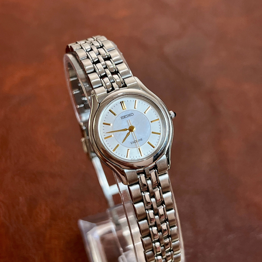 Seiko Exceline Women's Watch featuring blue dial and steel bracelet; vintage watch product image 1.