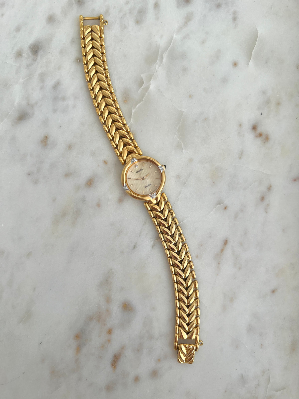 Seiko Exceline Woman's Watch with Diamonds and Sculpted Pattern Bracelet, product photograph 3.