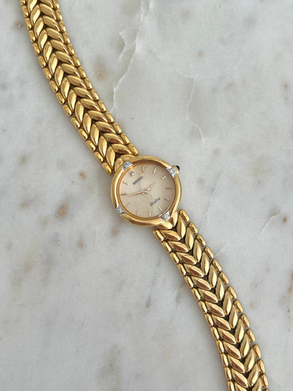 Seiko Exceline Woman's Watch with Diamonds and Sculpted Pattern Bracelet, dial close up of a vintage women's watch at Gilded Hour.