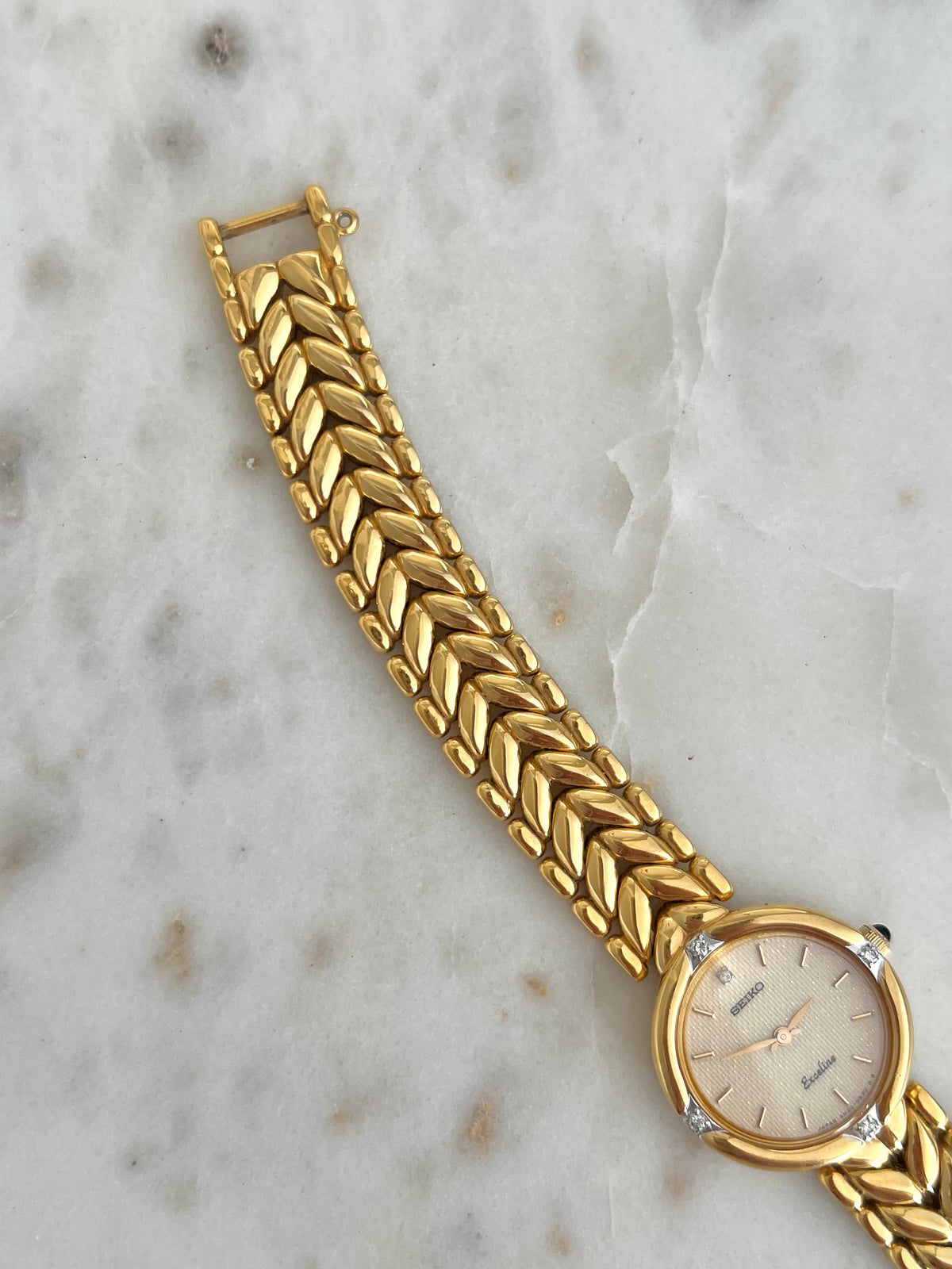Seiko Exceline Woman's Watch with Diamonds and Sculpted Pattern Bracelet, wrist shot of a vintage women's watch at Gilded Hour.