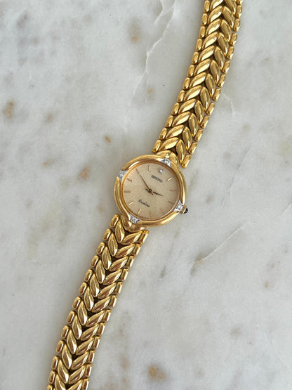 Seiko Exceline Woman's Watch with Diamonds and Sculpted Pattern Bracelet, bracelet detail of a vintage women's watch at Gilded Hour.