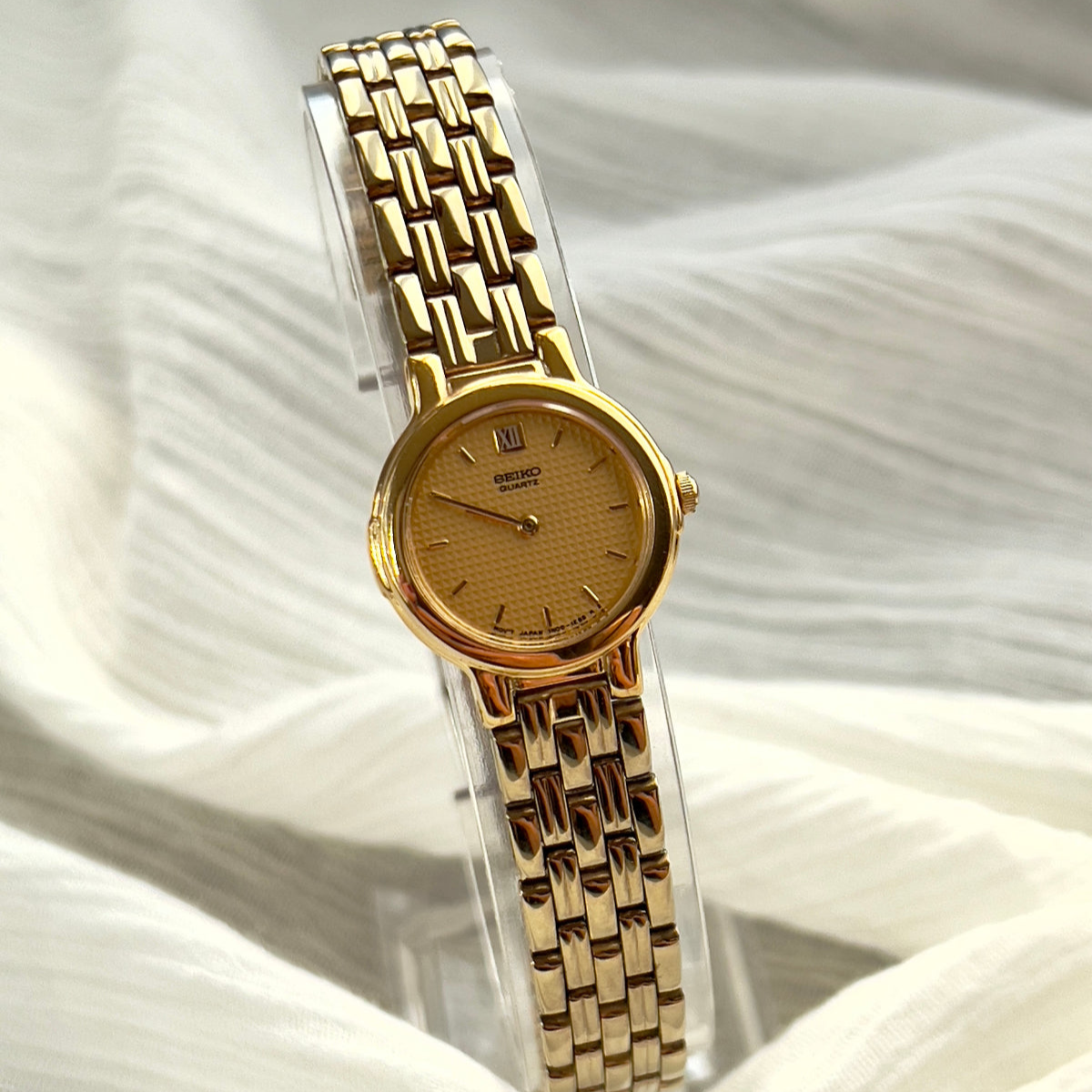 Seiko Champagne Textured Dial Two Tone Women's Watch — product photograph 1