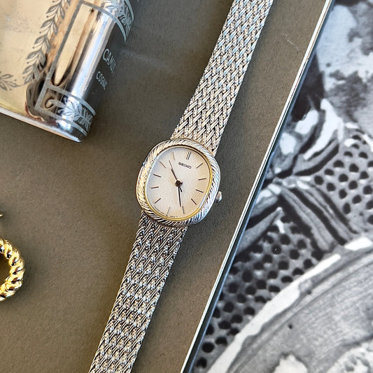 Seiko Oval Woman's Watch with a Rope Bezel & Textured Dial, dial close up of a vintage women's watch at Gilded Hour.