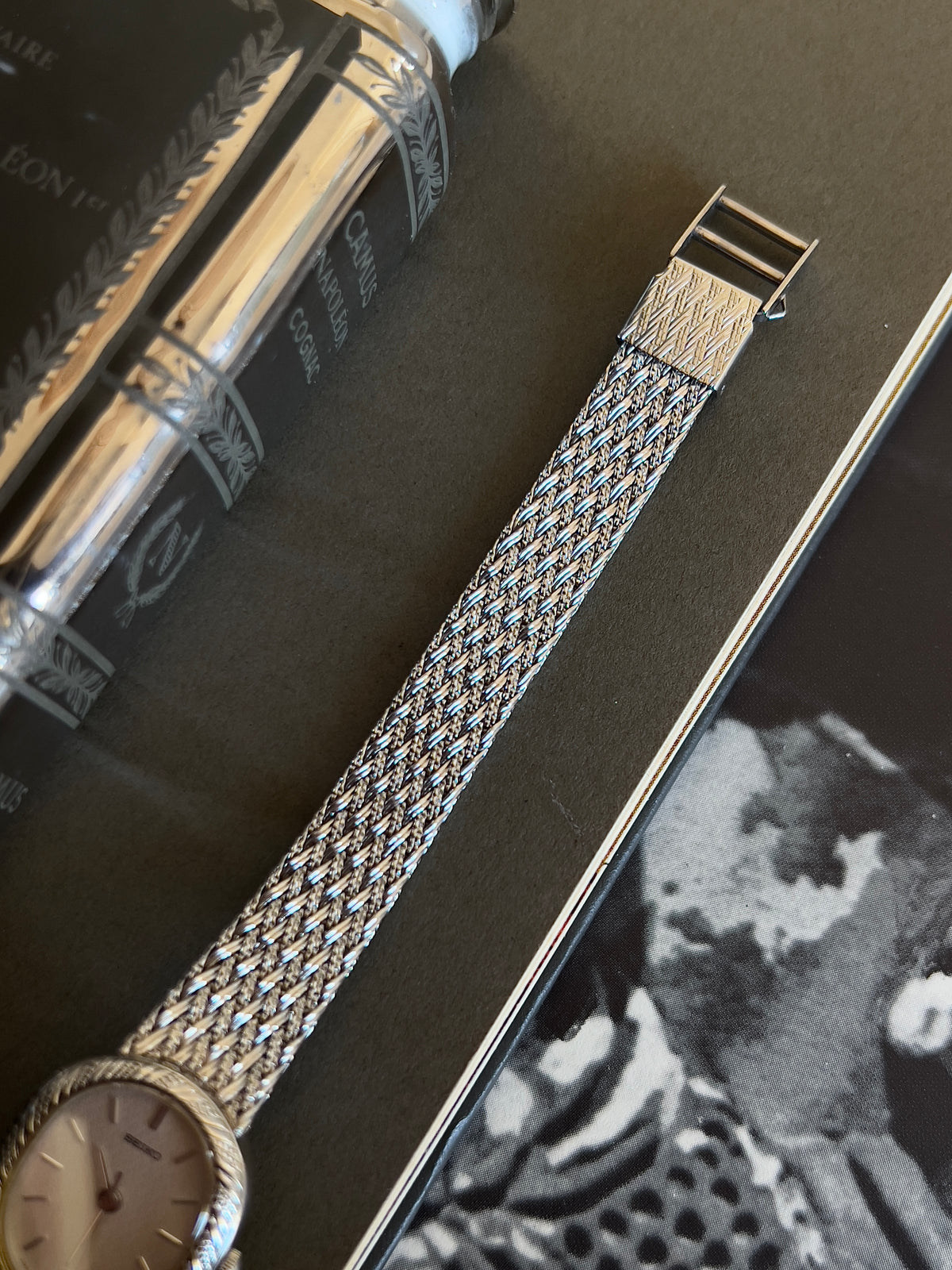 Seiko Oval Woman's Watch with a Rope Bezel & Textured Dial, dial close up of a vintage women's watch at Gilded Hour.