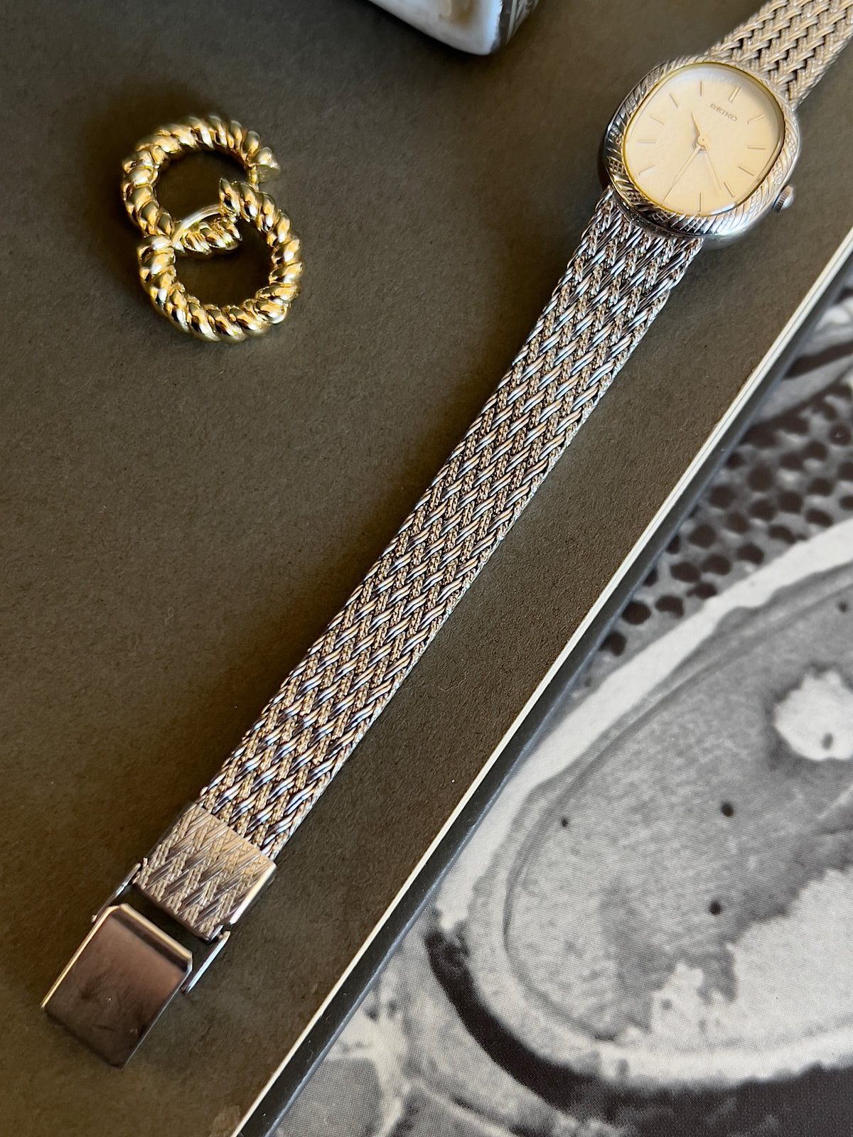 Seiko Oval Woman's Watch with a Rope Bezel & Textured Dial, angled view of a vintage women's watch at Gilded Hour.