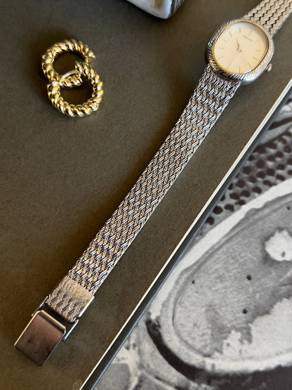 Seiko Oval Woman's Watch with a Rope Bezel & Textured Dial, angled view of a vintage women's watch at Gilded Hour.