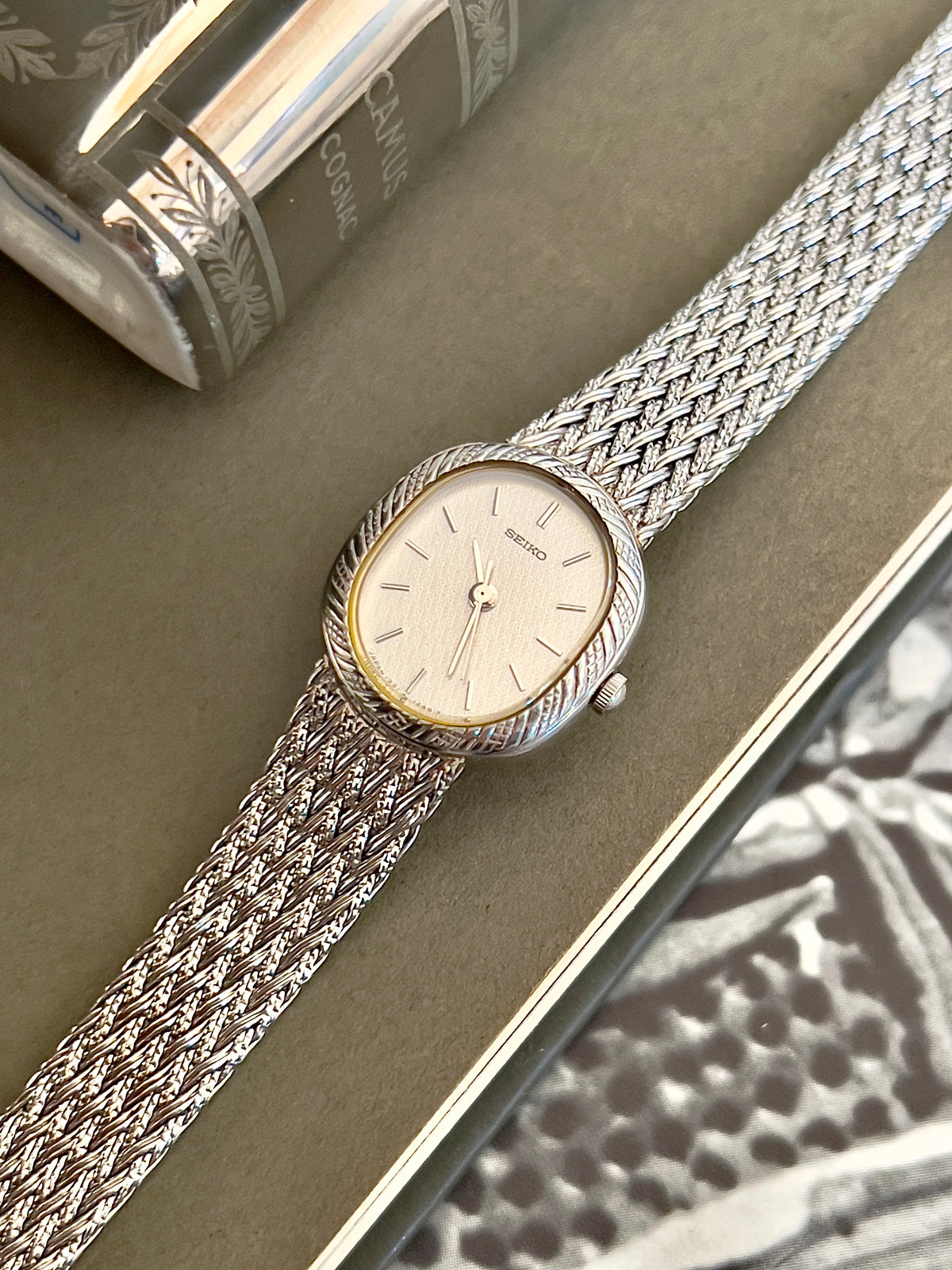 Seiko Oval Woman's Watch with a Rope Bezel & Textured Dial, wrist shot of a vintage women's watch at Gilded Hour.