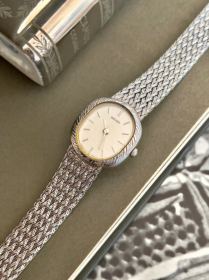Seiko Oval Woman's Watch with a Rope Bezel & Textured Dial, wrist shot of a vintage women's watch at Gilded Hour.