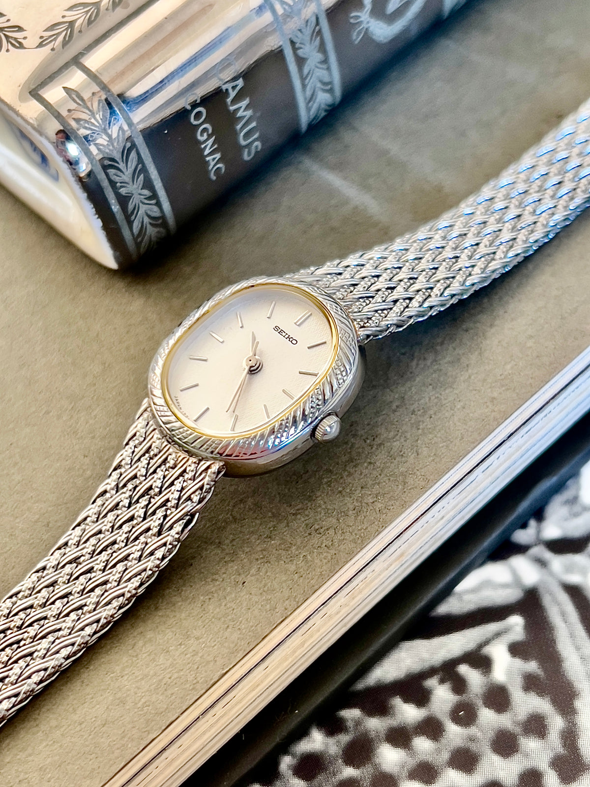 Seiko Oval Woman's Watch with a Rope Bezel & Textured Dial, case profile of a vintage women's watch at Gilded Hour.