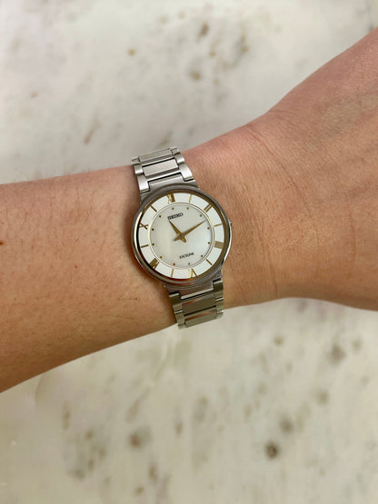 Seiko Exceline Mother of Pearl Silver Bracelet Women’s Watch; integrated silver tone bracelet with brushed and polished links. Product photograph 2 of 9.