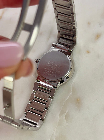 Seiko Exceline Mother of Pearl Silver Bracelet Women’s Watch; integrated silver tone bracelet with brushed and polished links. Product photograph 3 of 9.