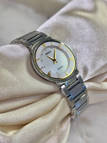 Seiko Exceline Mother of Pearl Silver Bracelet Women’s Watch; integrated silver tone bracelet with brushed and polished links. Product photograph 4 of 9.