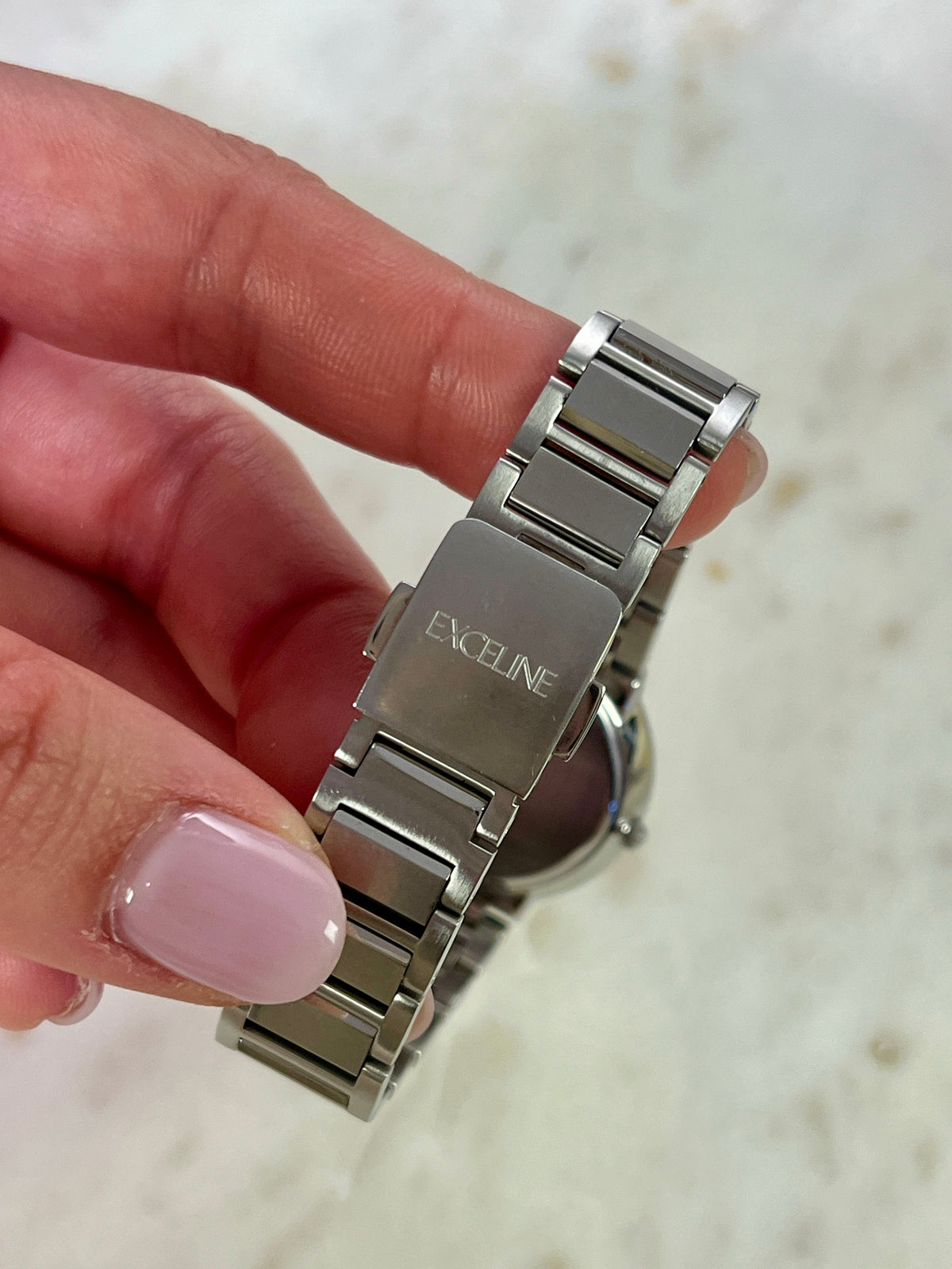 Seiko Exceline Mother of Pearl Silver Bracelet Women’s Watch; integrated silver tone bracelet with brushed and polished links. Product photograph 5 of 9.