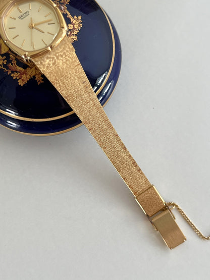 Seiko Gold Cushion Tatami Bracelet Women’s Watch — Close front view of the three hand dial