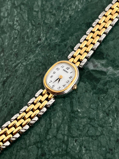 Detail of the Seiko two-tone bracelet with gold accent links.
