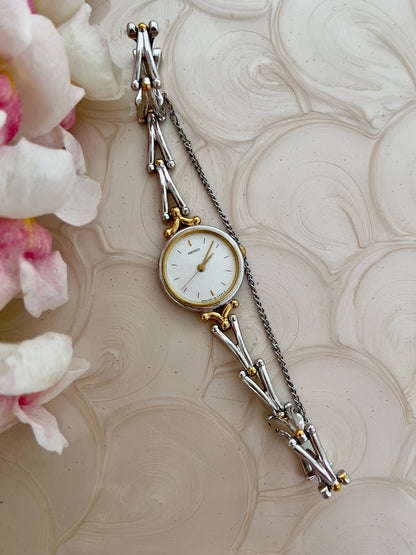 Seiko Two Tone Women’s Watch with White Dial and Sculpted Bracelet — full bracelet and white dial.