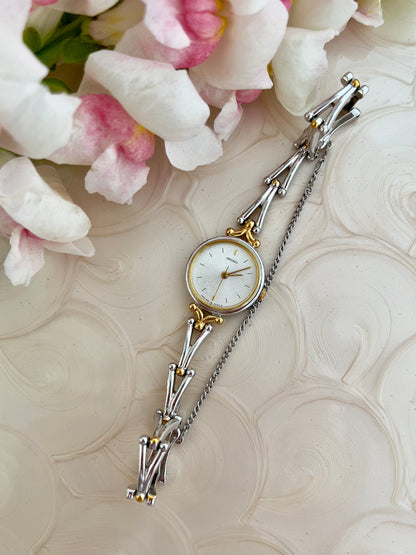 Seiko Two Tone Women’s Watch with White Dial and Sculpted Bracelet — front view of case and bracelet.