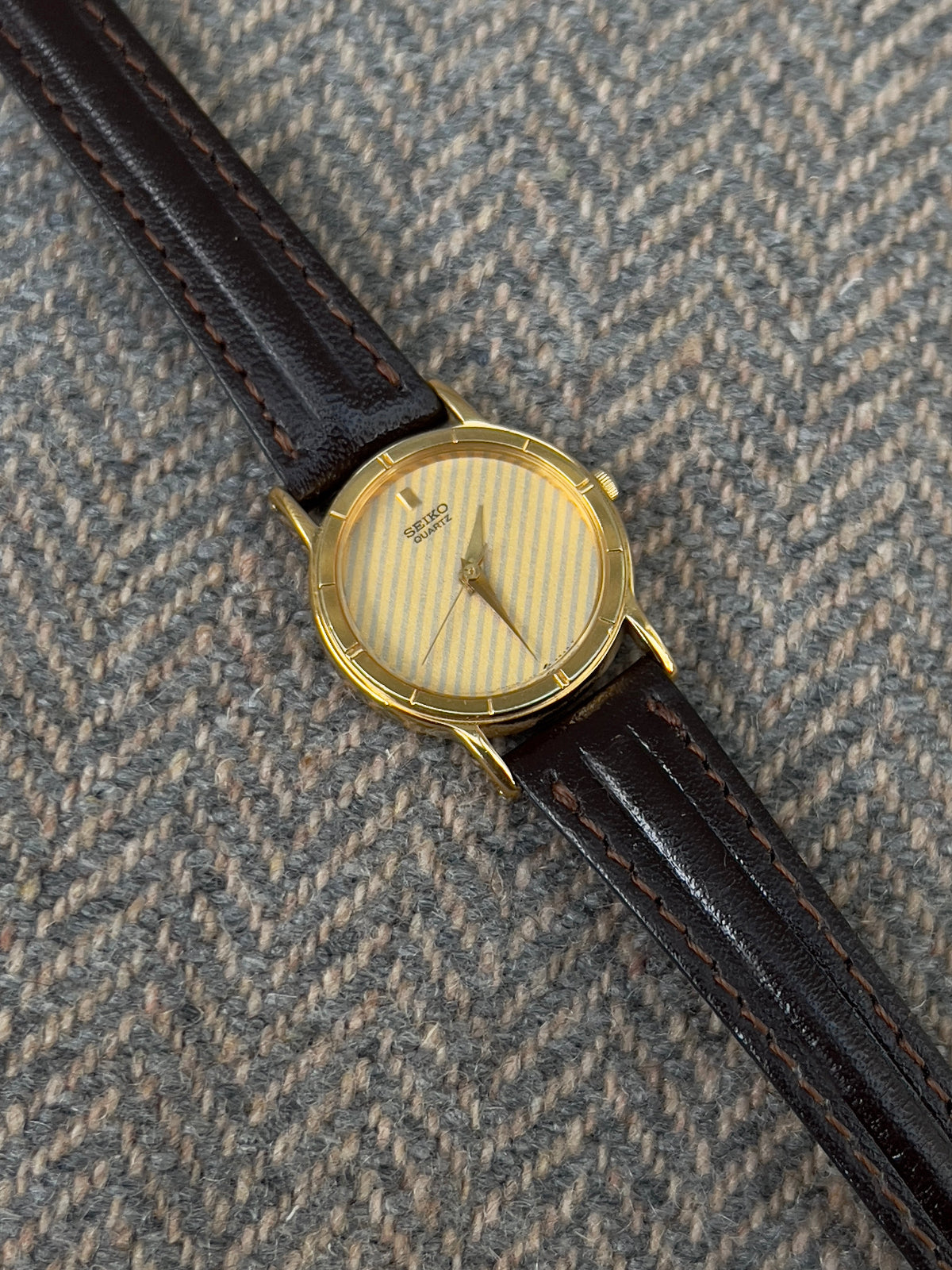 Seiko Gold Tone Striped Dial Leather Strap Women's Watch | Product photograph 2