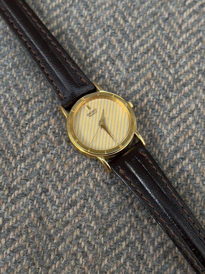Seiko Gold Tone Striped Dial Leather Strap Women's Watch | Product photograph 2